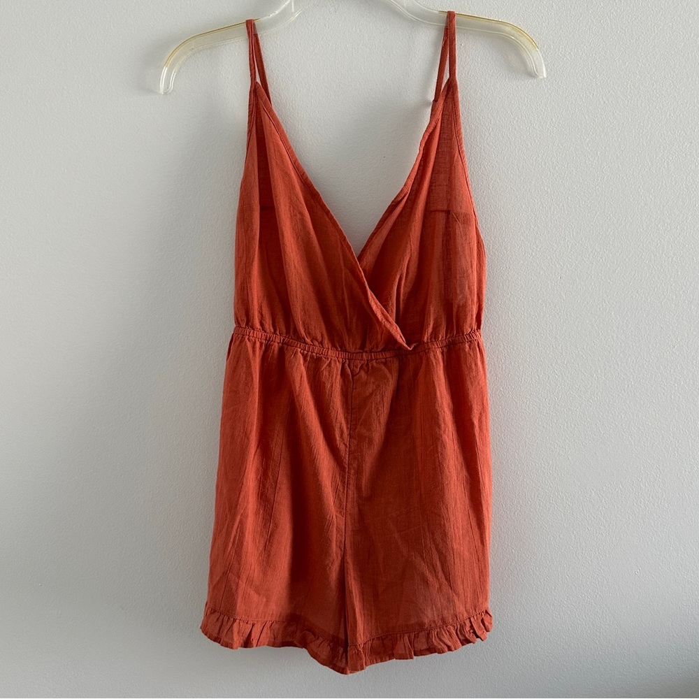 Roxy beach romper in a rust color